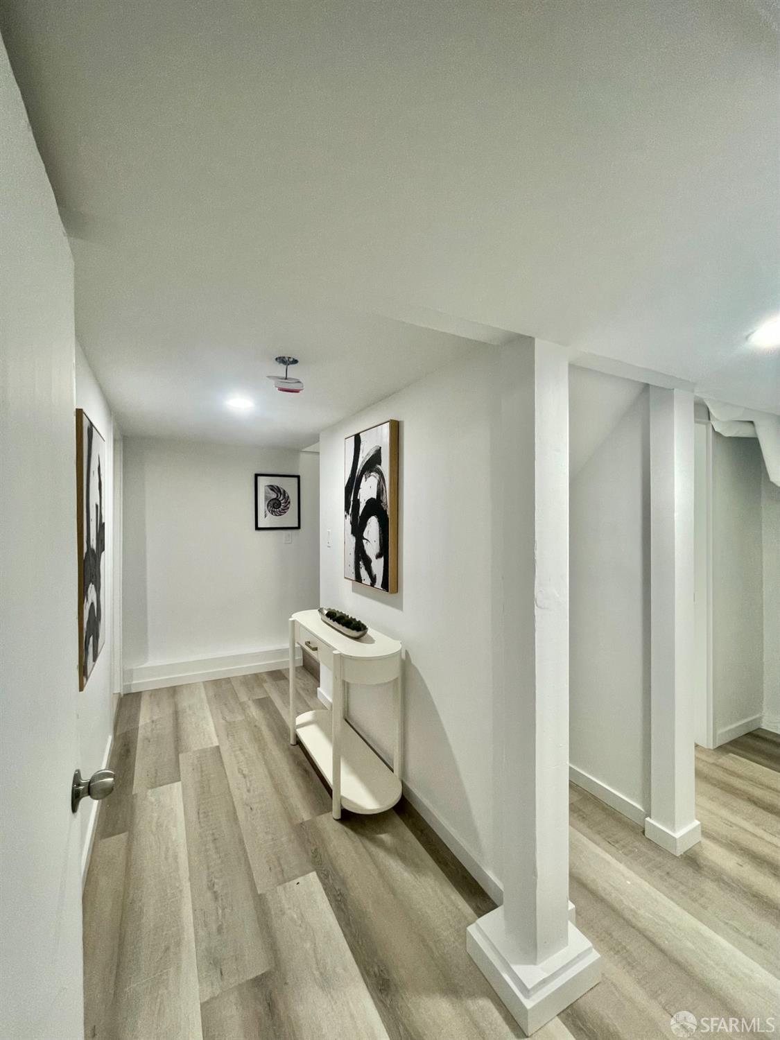 37 Ruth Street San Francisco, CA 94112 - Photo 17 of 26 a view of a hallway with bathroom