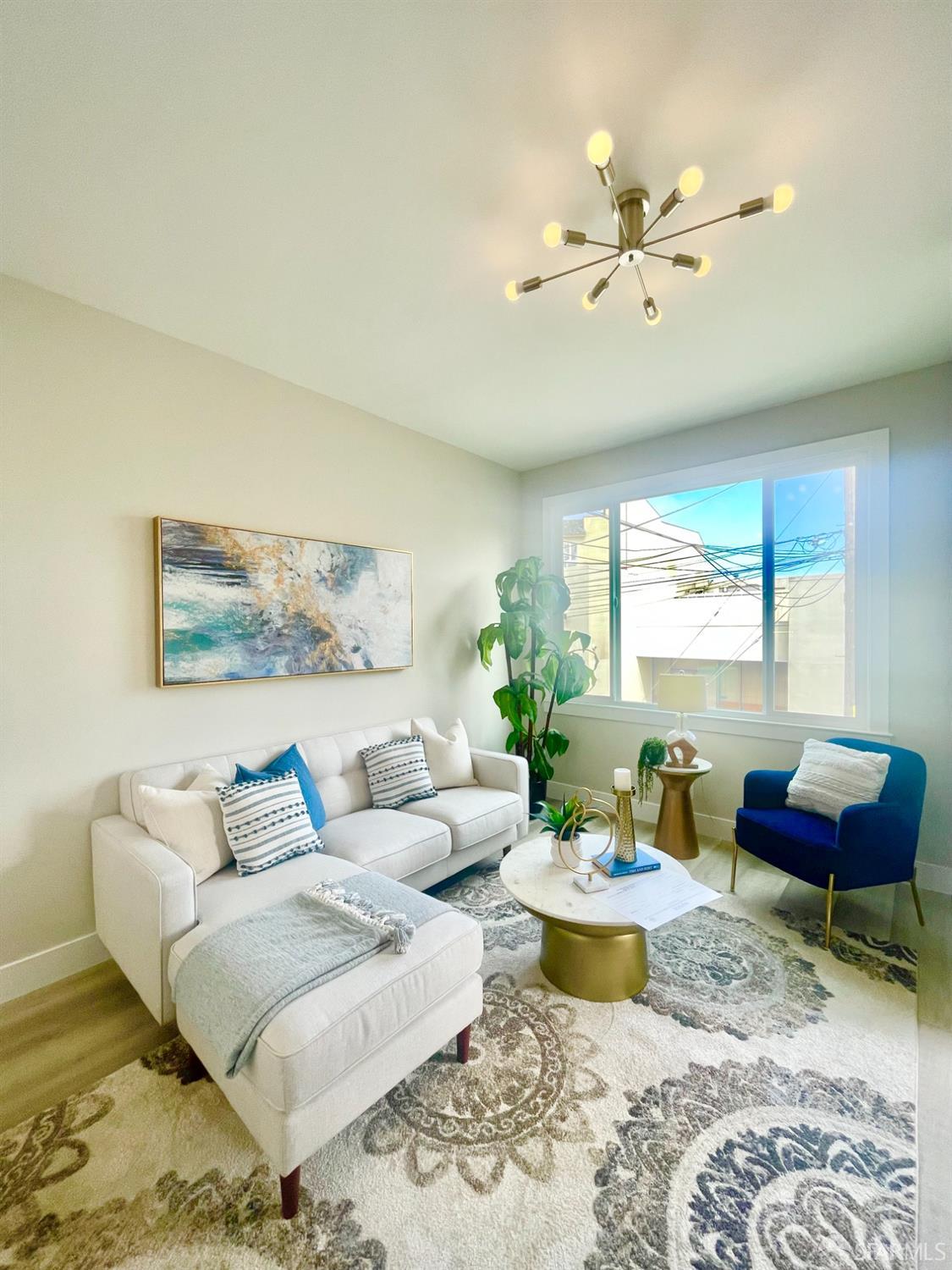 37 Ruth Street San Francisco, CA 94112 - Photo 4 of 26 a living room with furniture and a large window