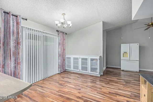 a view of a livingroom with wooden floor