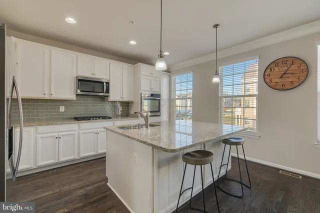 a bedroom with a bed and a cabinets