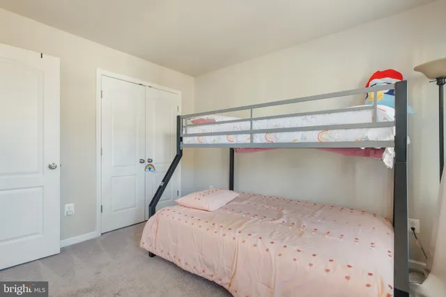 a view of a balcony with wooden floor