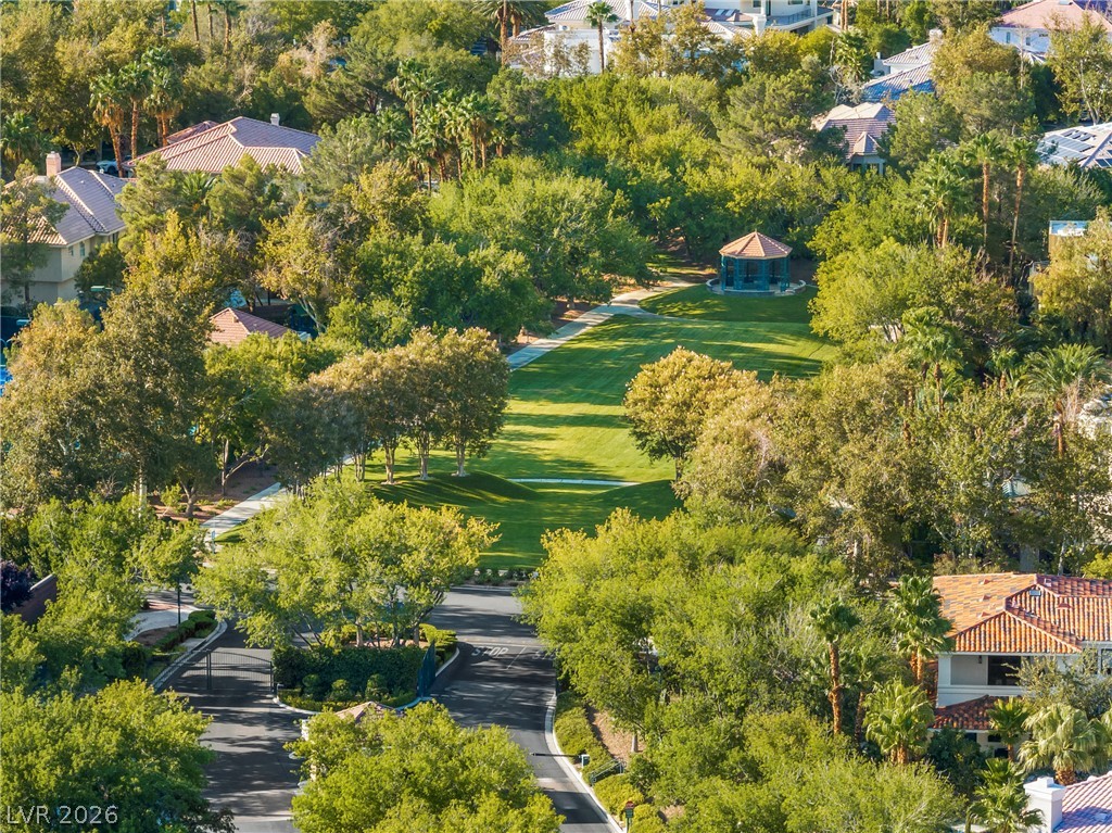 2000 Grouse Street Las Vegas, NV 89134 - Photo 75 of 89 Discover a private park with lush landscaping and a charming gazebo, nestled within a secure, verdant neighborhood.