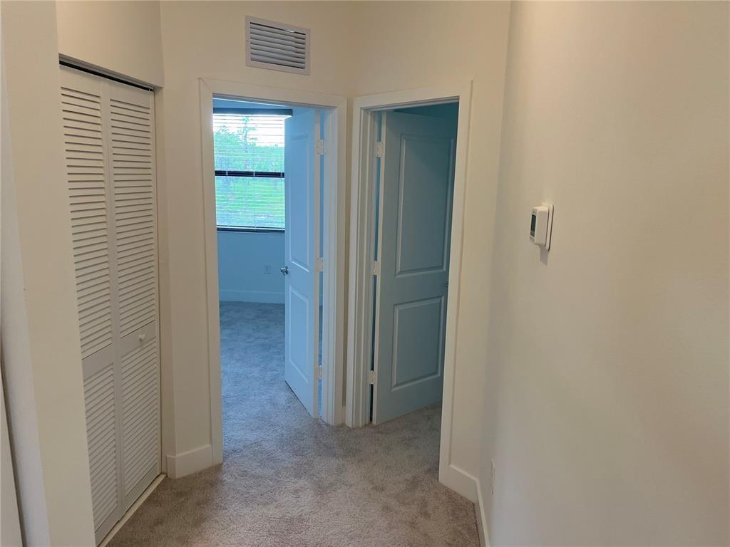 Undisclosed Address Immokalee, FL 34142 - Photo 14 of 30 an empty room with windows and closet