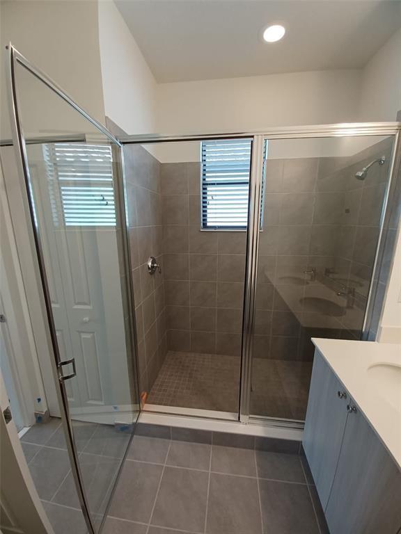 Undisclosed Address Immokalee, FL 34142 - Photo 18 of 30 a bathroom with a glass door shower