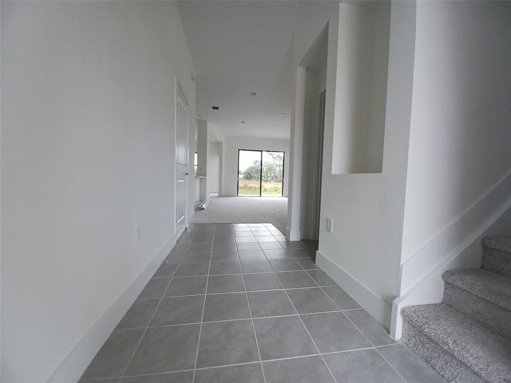 Undisclosed Address Immokalee, FL 34142 - Photo 3 of 30 a view of an entryway of a house