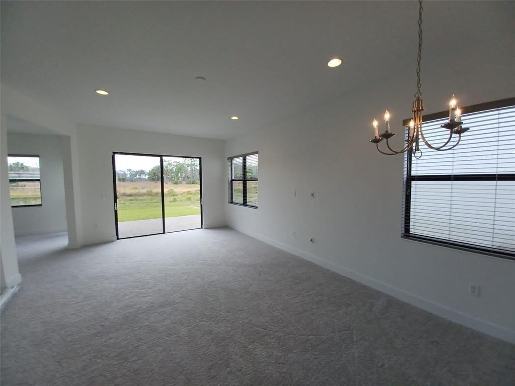 Undisclosed Address Immokalee, FL 34142 - Photo 4 of 30 a view of an empty room with a window