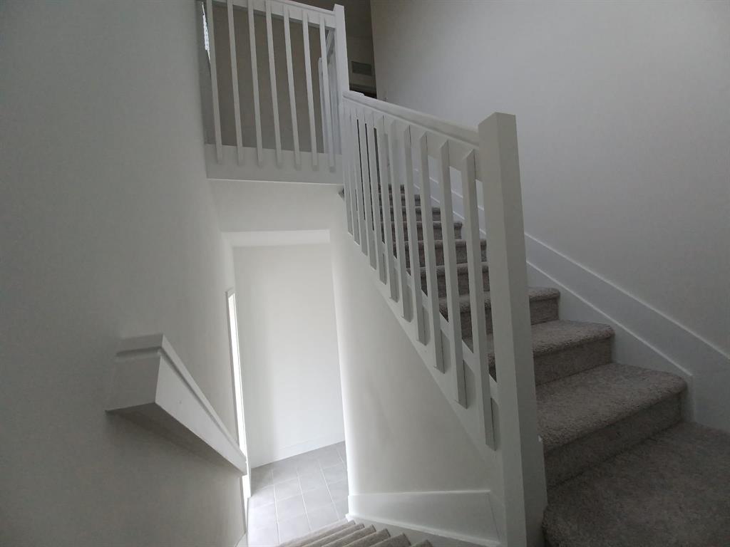 Undisclosed Address Immokalee, FL 34142 - Photo 9 of 30 a view of entryway with stairs
