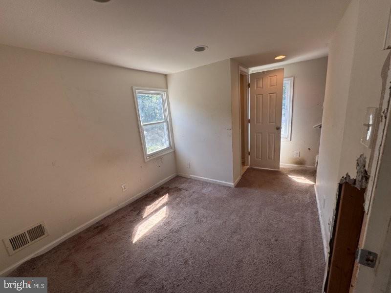 338 Springfield Road Aldan, PA 19018 - Photo 13 of 18 a view of empty room with windows