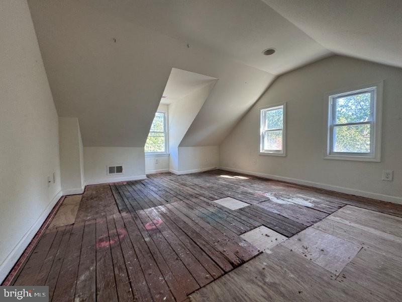 338 Springfield Road Aldan, PA 19018 - Photo 15 of 18 wooden floor in an empty room with a window