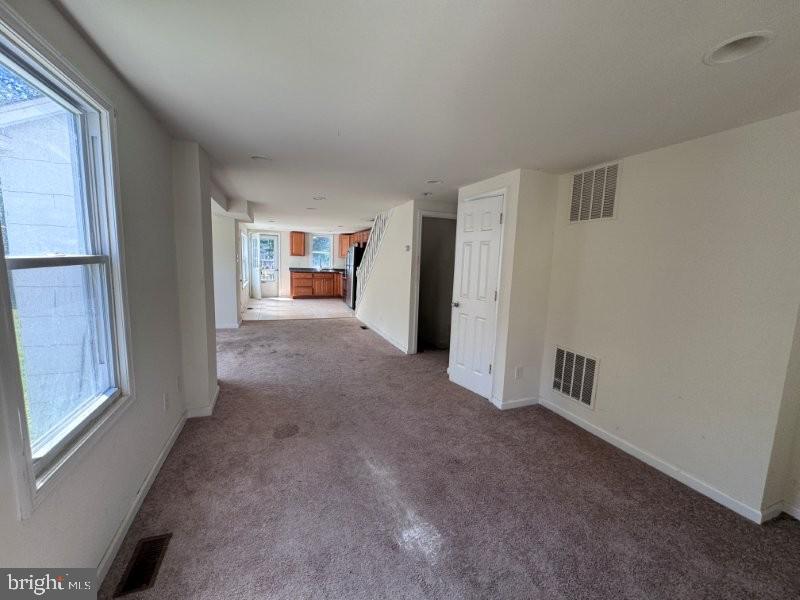 338 Springfield Road Aldan, PA 19018 - Photo 6 of 18 a view of a livingroom with a staircase