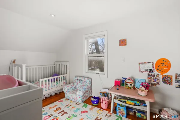 a bedroom with furniture and a couch