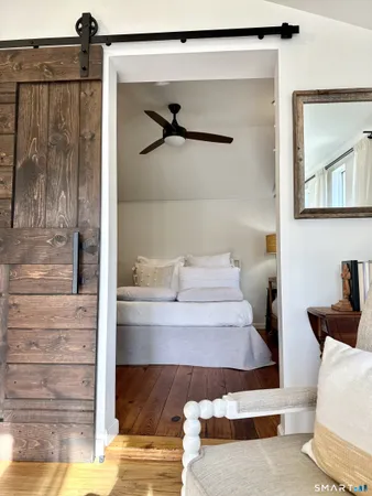 a view of bedroom and bathroom