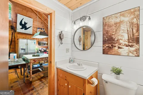 a view of a balcony with wooden floor
