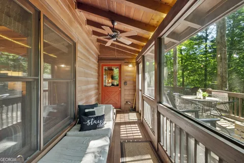 a view of outdoor sitting area with furniture