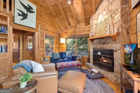 a view of a living room filled with furniture