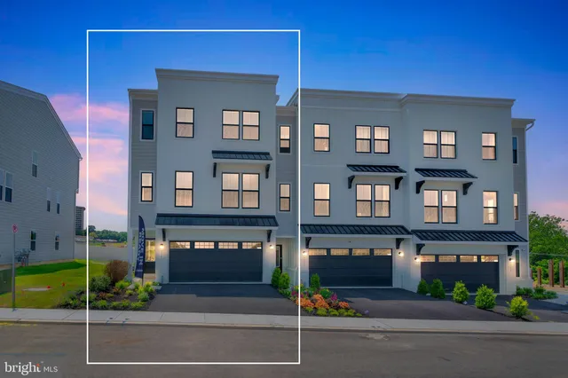 a front view of building with yard