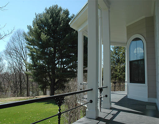 180 Moss Hill Road Boston, MA 02130 - Photo 2 of 9 a front view of a house with garden