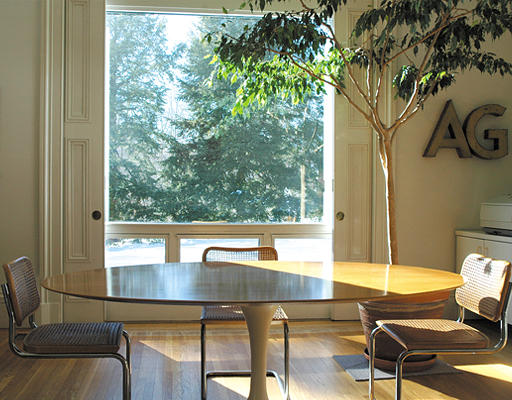 180 Moss Hill Road Boston, MA 02130 - Photo 6 of 9 a living room with a table and chair