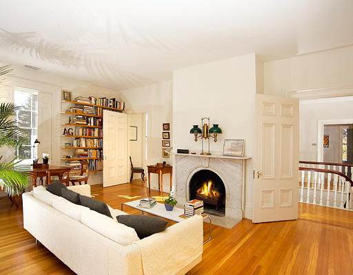 180 Moss Hill Road Boston, MA 02130 - Photo 7 of 9 a living room with furniture and a fireplace