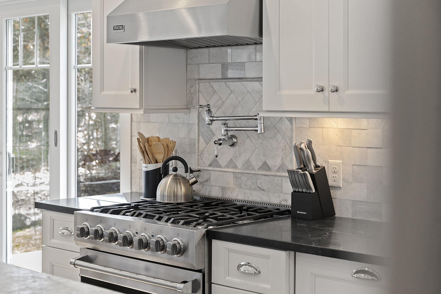 16 Mockingbird Drive Edgartown, MA 02539 - Photo 11 of 36 a stove top oven sitting inside of a kitchen