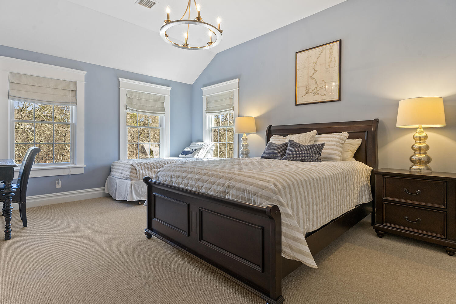 16 Mockingbird Drive Edgartown, MA 02539 - Photo 21 of 36 a bedroom with a bed and a table chair