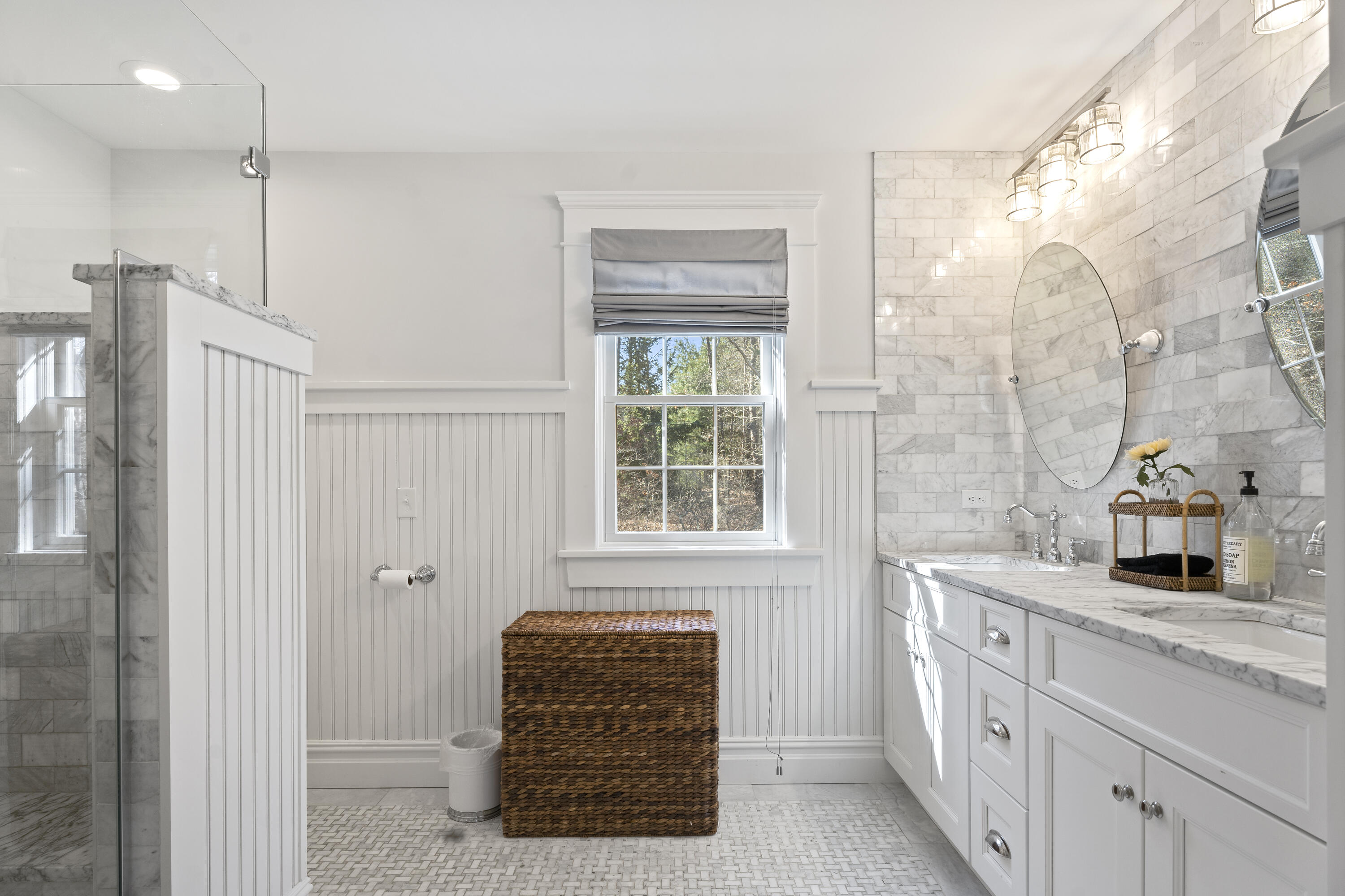16 Mockingbird Drive Edgartown, MA 02539 - Photo 23 of 36 a bathroom with a tub sink and mirror