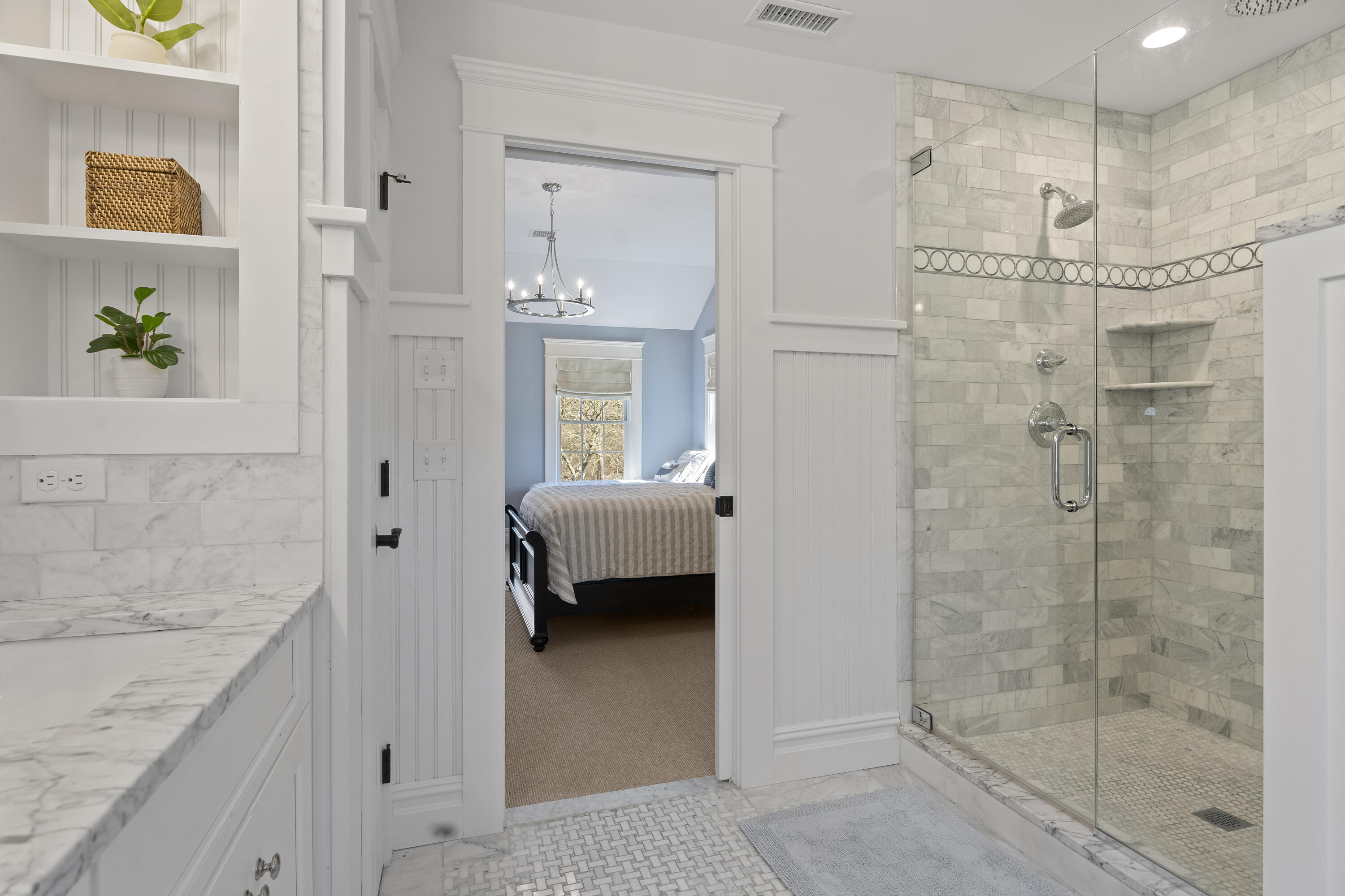 16 Mockingbird Drive Edgartown, MA 02539 - Photo 24 of 36 a en suite bathroom with a granite countertop sink a mirror and shower