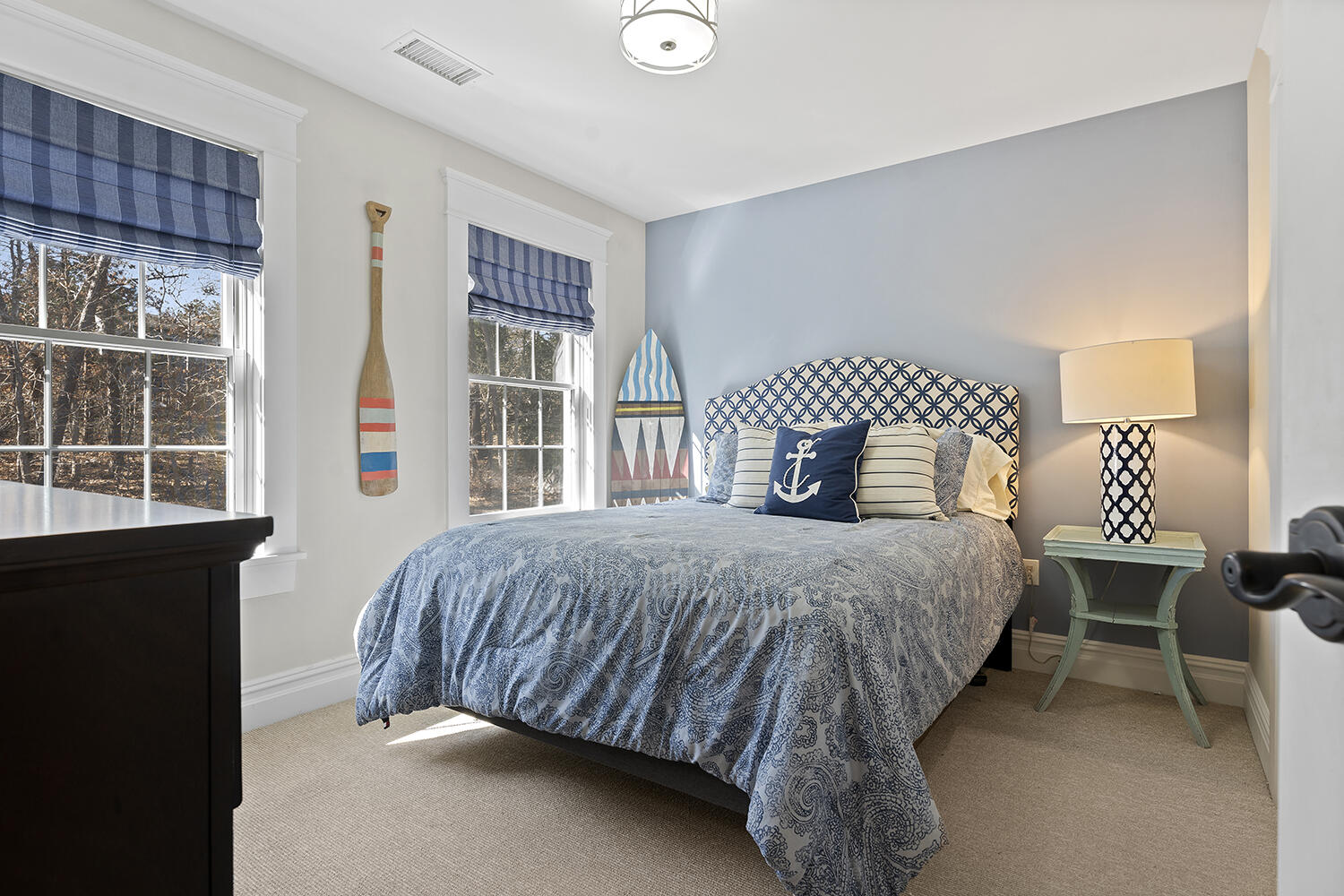 16 Mockingbird Drive Edgartown, MA 02539 - Photo 29 of 36 a bedroom with a bed and wooden floor