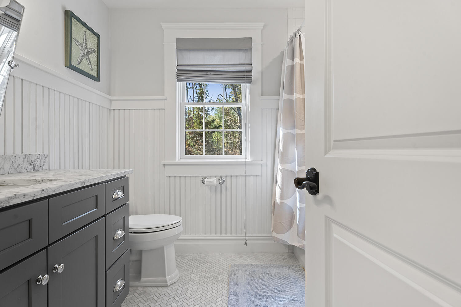 16 Mockingbird Drive Edgartown, MA 02539 - Photo 30 of 36 a bathroom with a sink toilet and shower
