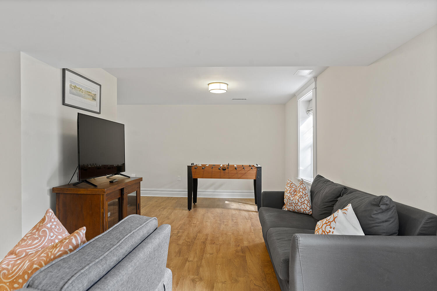 16 Mockingbird Drive Edgartown, MA 02539 - Photo 34 of 36 a living room with furniture and a flat screen tv