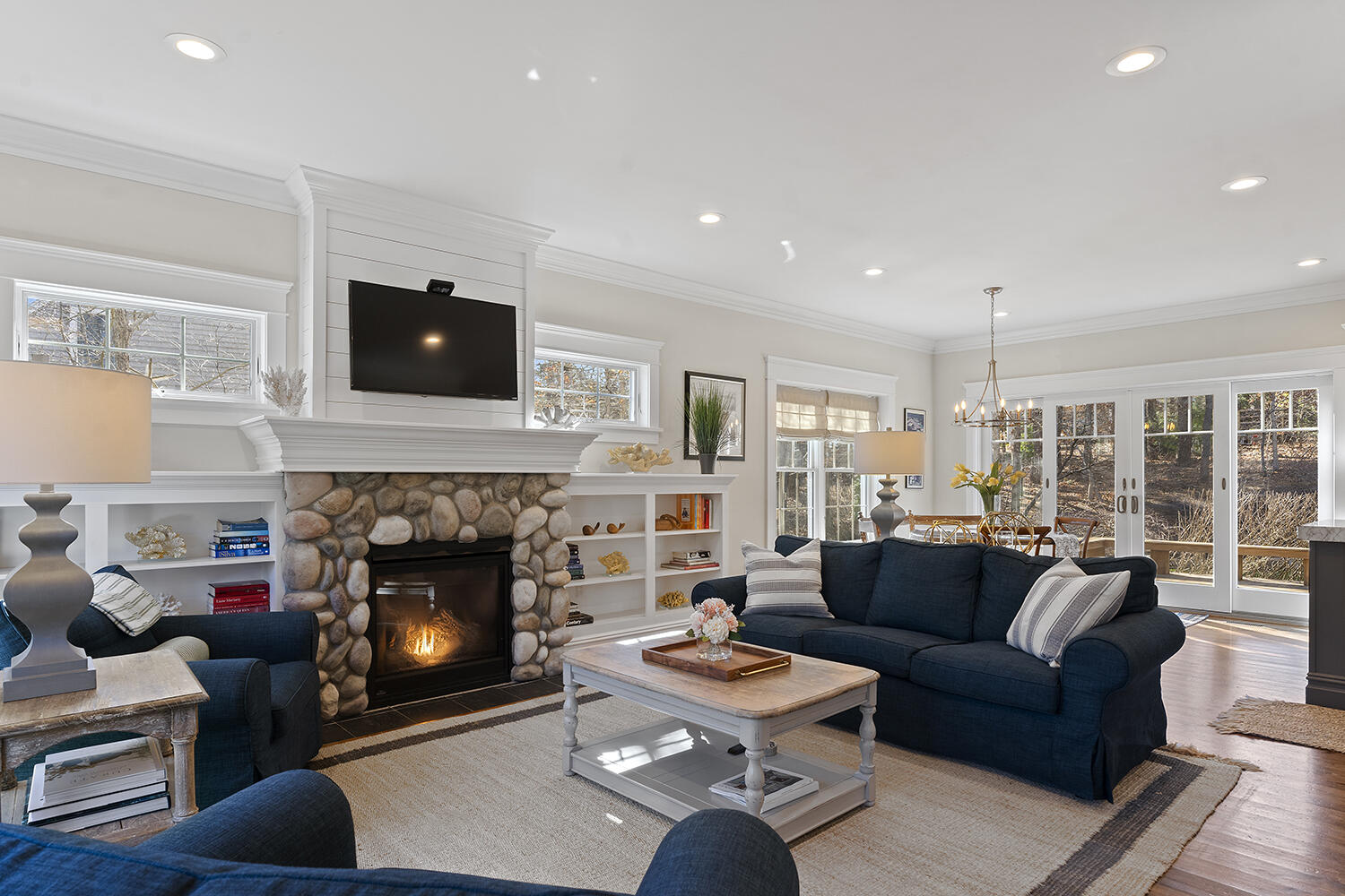 16 Mockingbird Drive Edgartown, MA 02539 - Photo 4 of 36 a living room with furniture and a fireplace