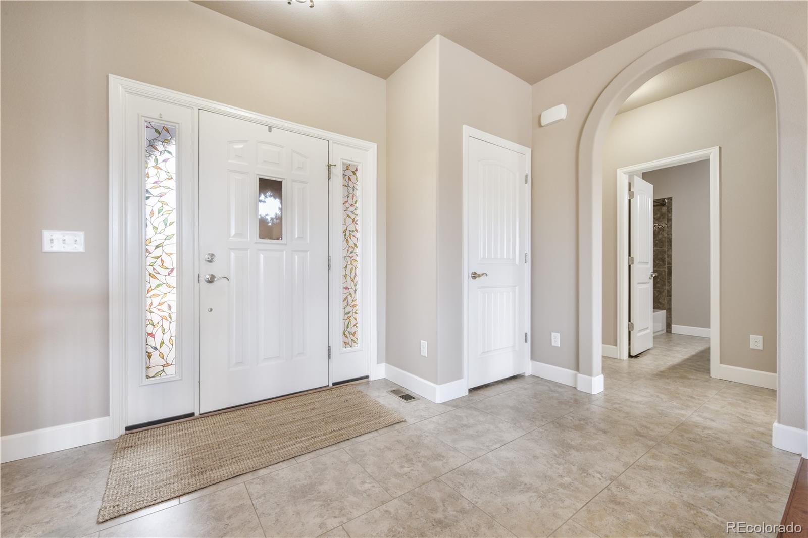 10484 Mile Post Loop Fountain, CO 80817 - Photo 2 of 50 an empty room with windows and closet