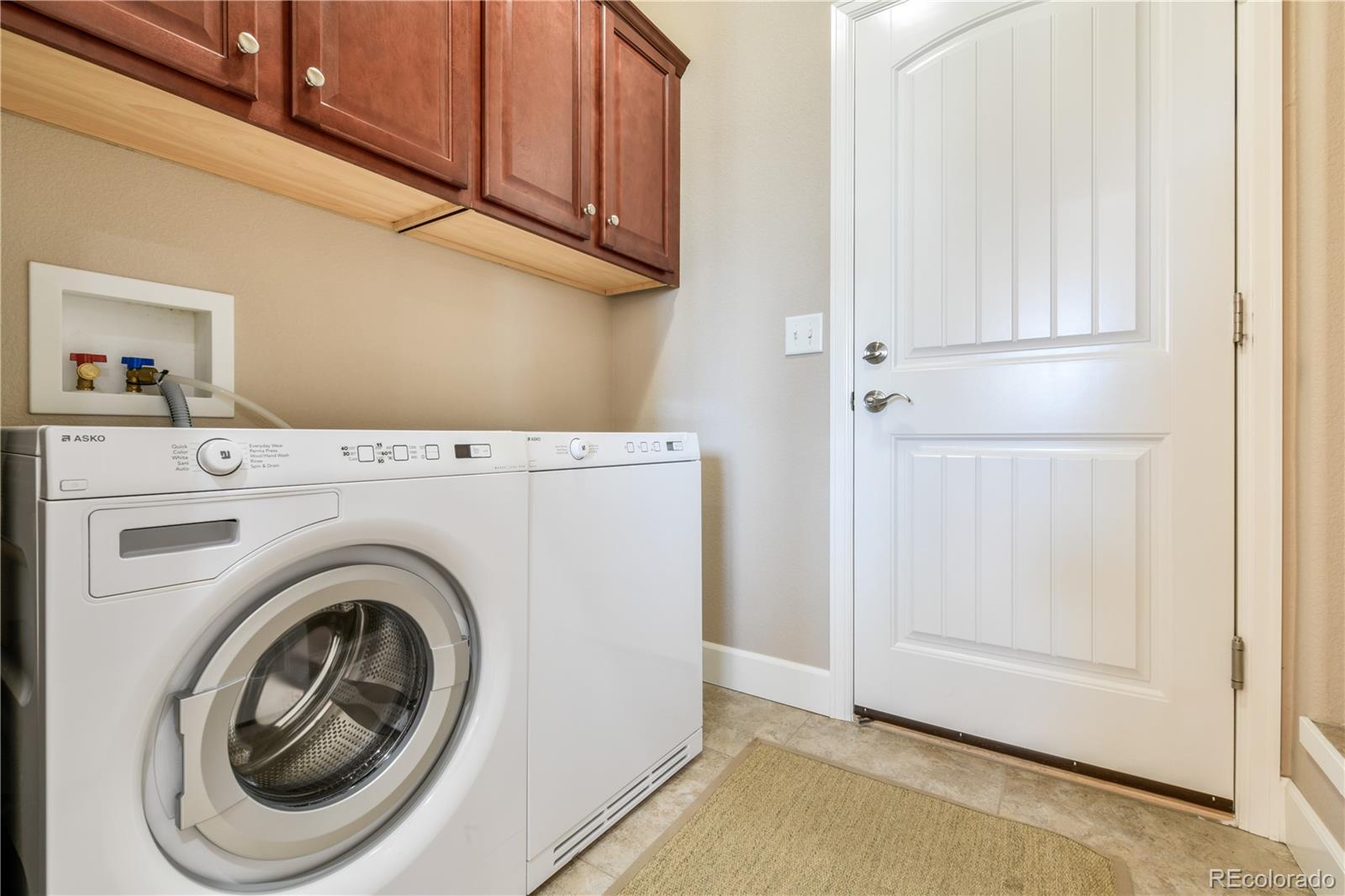 10484 Mile Post Loop Fountain, CO 80817 - Photo 23 of 50 a utility room with dryer and washer