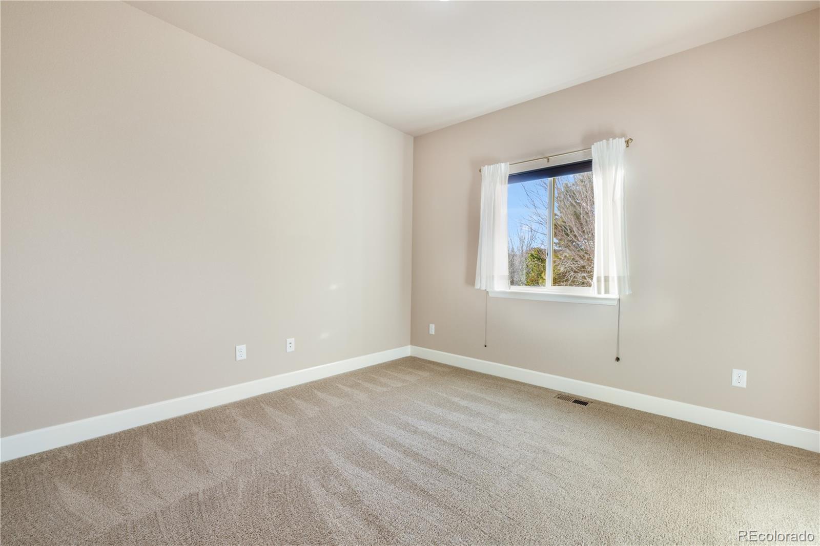 10484 Mile Post Loop Fountain, CO 80817 - Photo 26 of 50 an empty room with a window