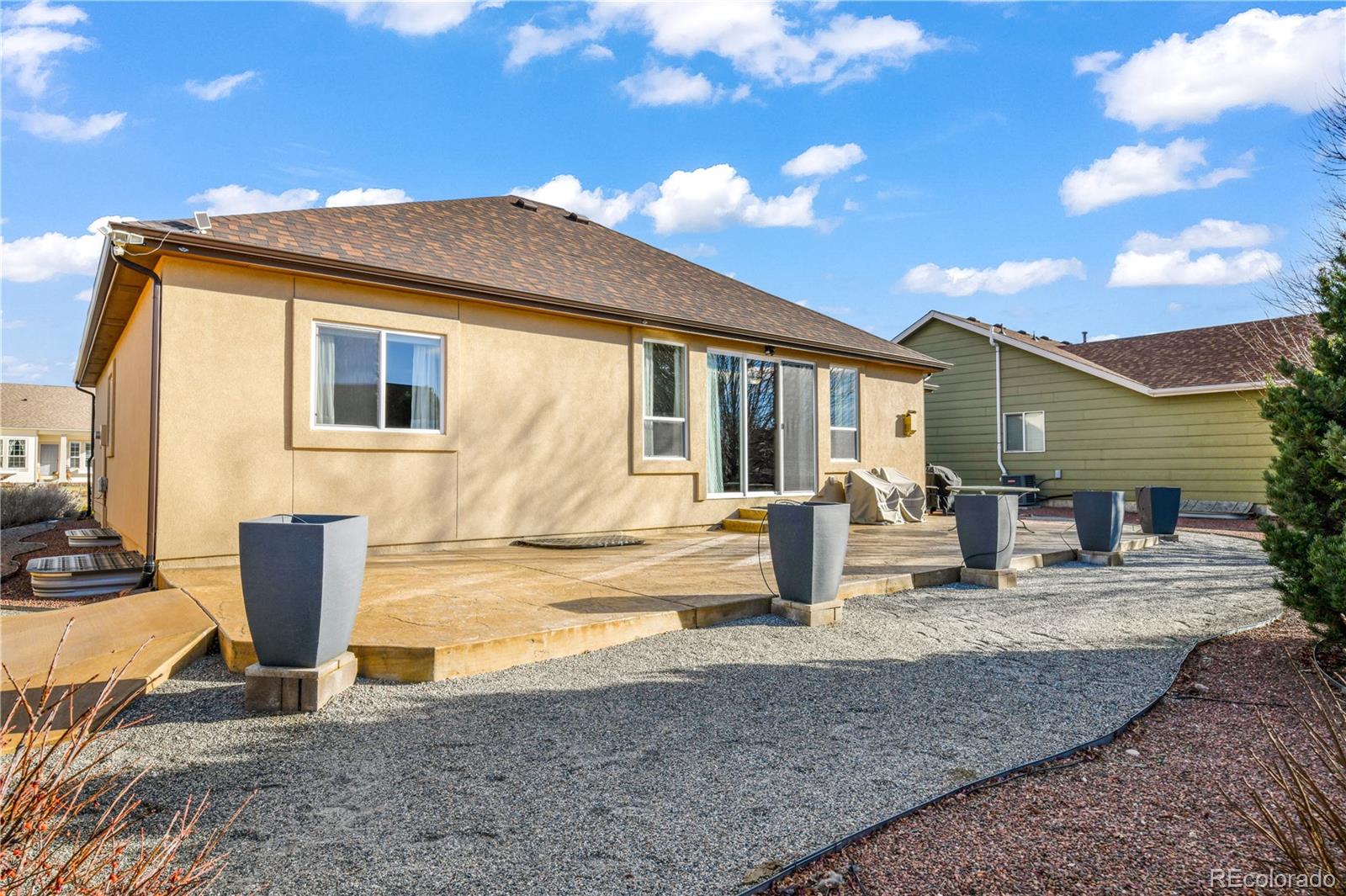 10484 Mile Post Loop Fountain, CO 80817 - Photo 45 of 50 a view of a house with patio