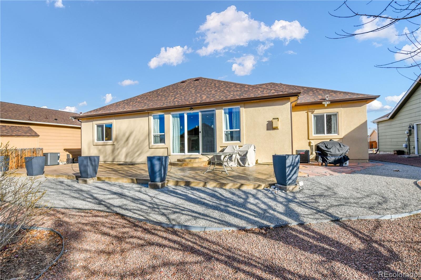 10484 Mile Post Loop Fountain, CO 80817 - Photo 46 of 50 a view of a house with backyard and sitting area