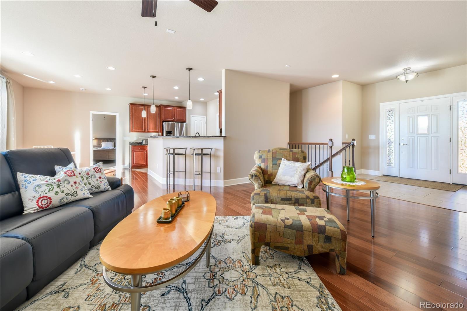 10484 Mile Post Loop Fountain, CO 80817 - Photo 6 of 50 a living room with furniture and a wooden floor