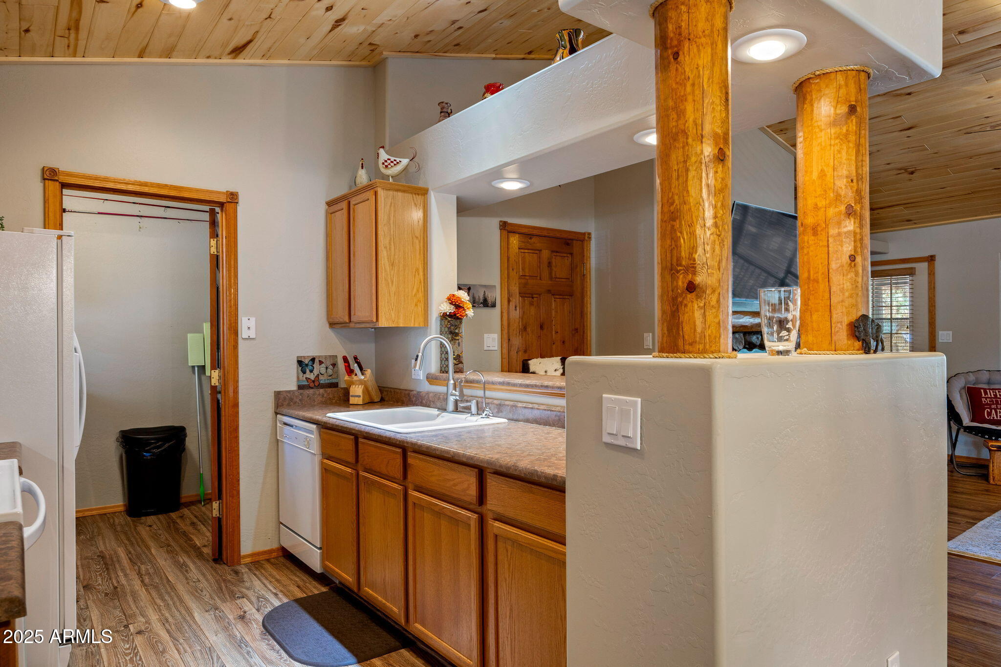 2692 Palomino Trail Overgaard, AZ 85933 - Photo 10 of 33 a bathroom with a sink a mirror and a shower