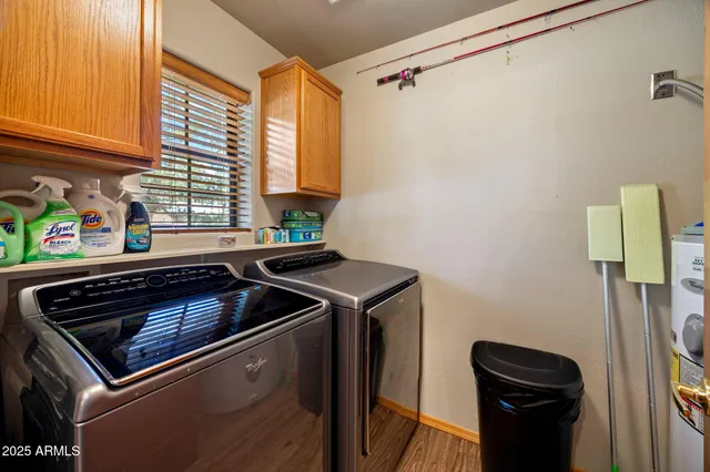 a bathroom with a sink a mirror and a shower