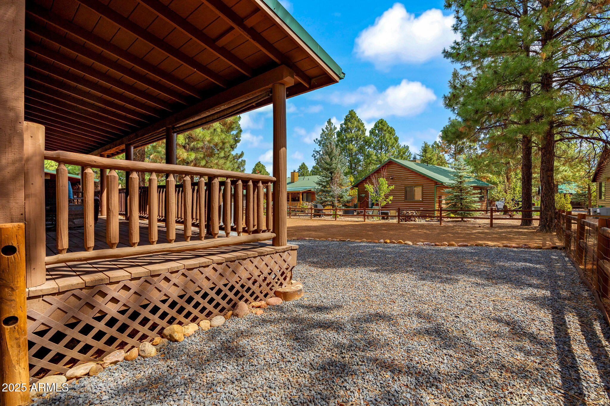 2692 Palomino Trail Overgaard, AZ 85933 - Photo 20 of 33 a view of yard with wooden fence