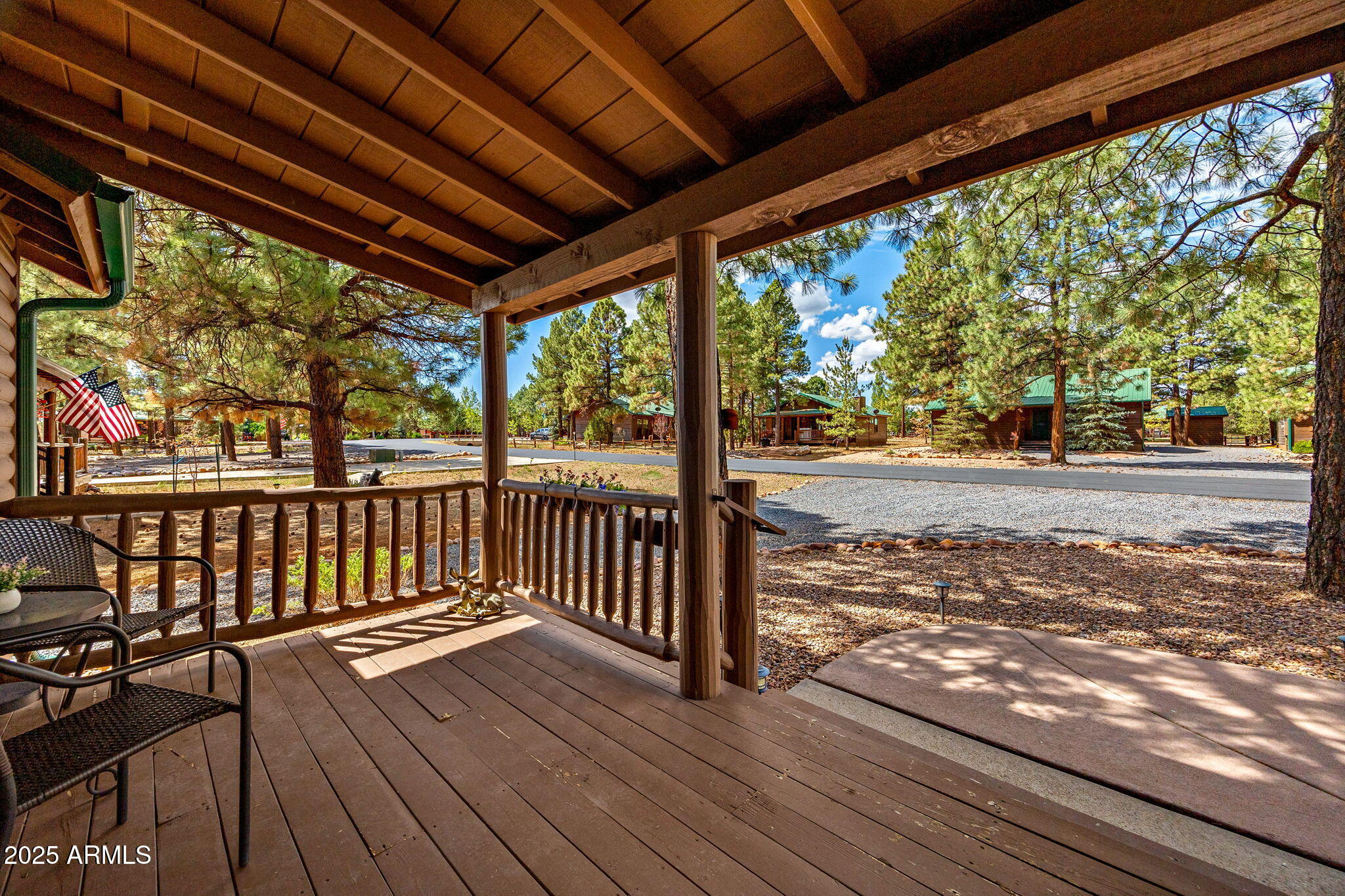2692 Palomino Trail Overgaard, AZ 85933 - Photo 4 of 33 a view of a porch with wooden floor