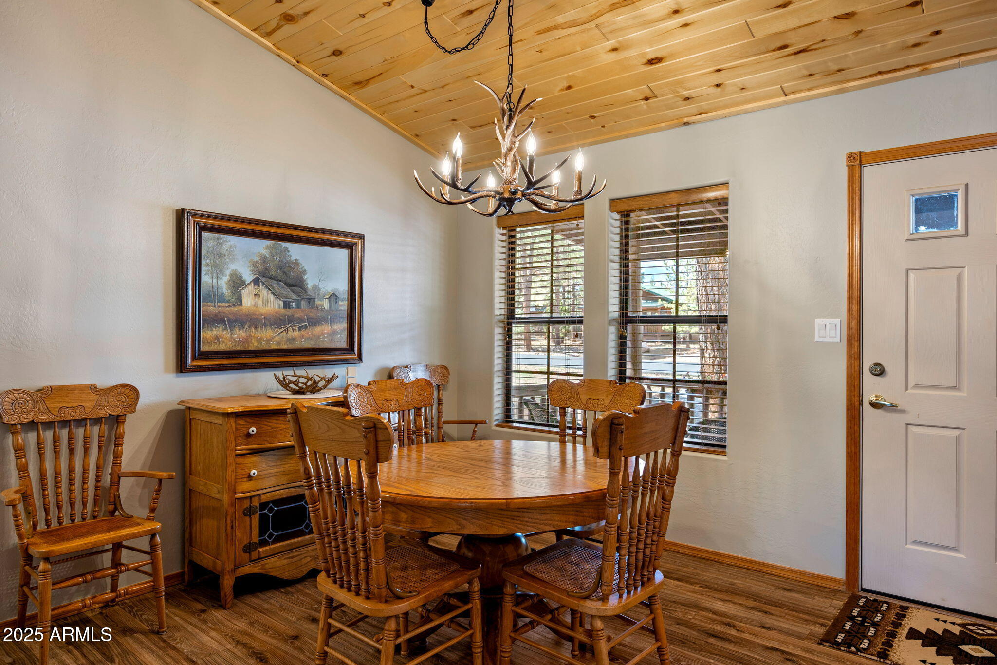 2692 Palomino Trail Overgaard, AZ 85933 - Photo 8 of 33 a view of a dining room with furniture window and wooden floor