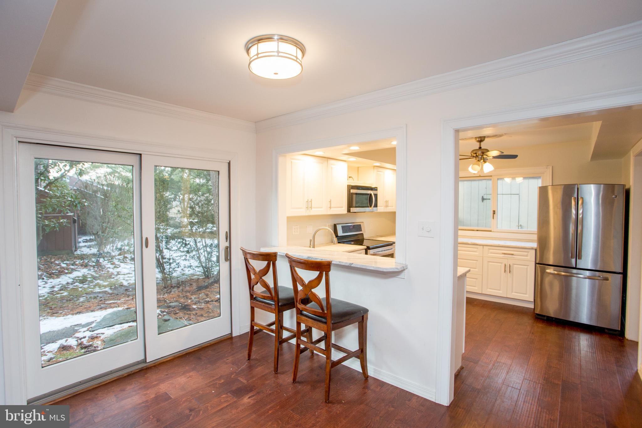 17 Eden Roc New Hope, PA 18938 - Photo 10 of 27 Dining area off the kitchen with sliding door