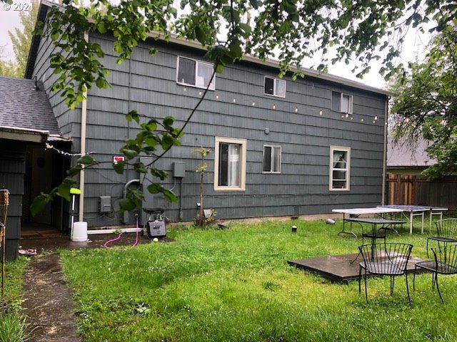 1539 Villard Street Eugene, OR 97403 - Photo 4 of 13 a view of a house with a backyard