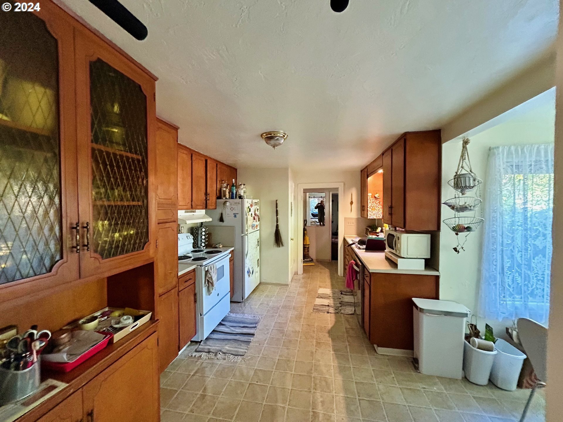 1539 Villard Street Eugene, OR 97403 - Photo 7 of 13 a room with furniture and a kitchen view