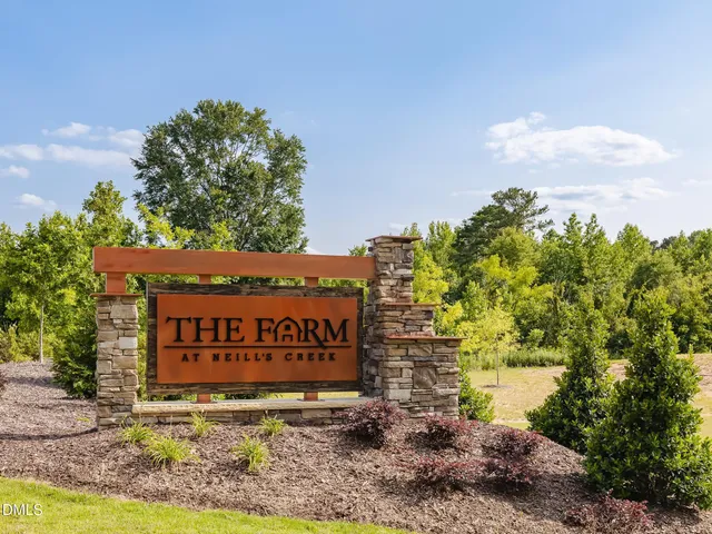 a sign on the side of the road