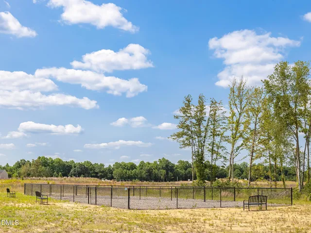 a view of a lake with a house