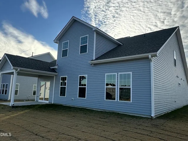 a front view of a house with balcony