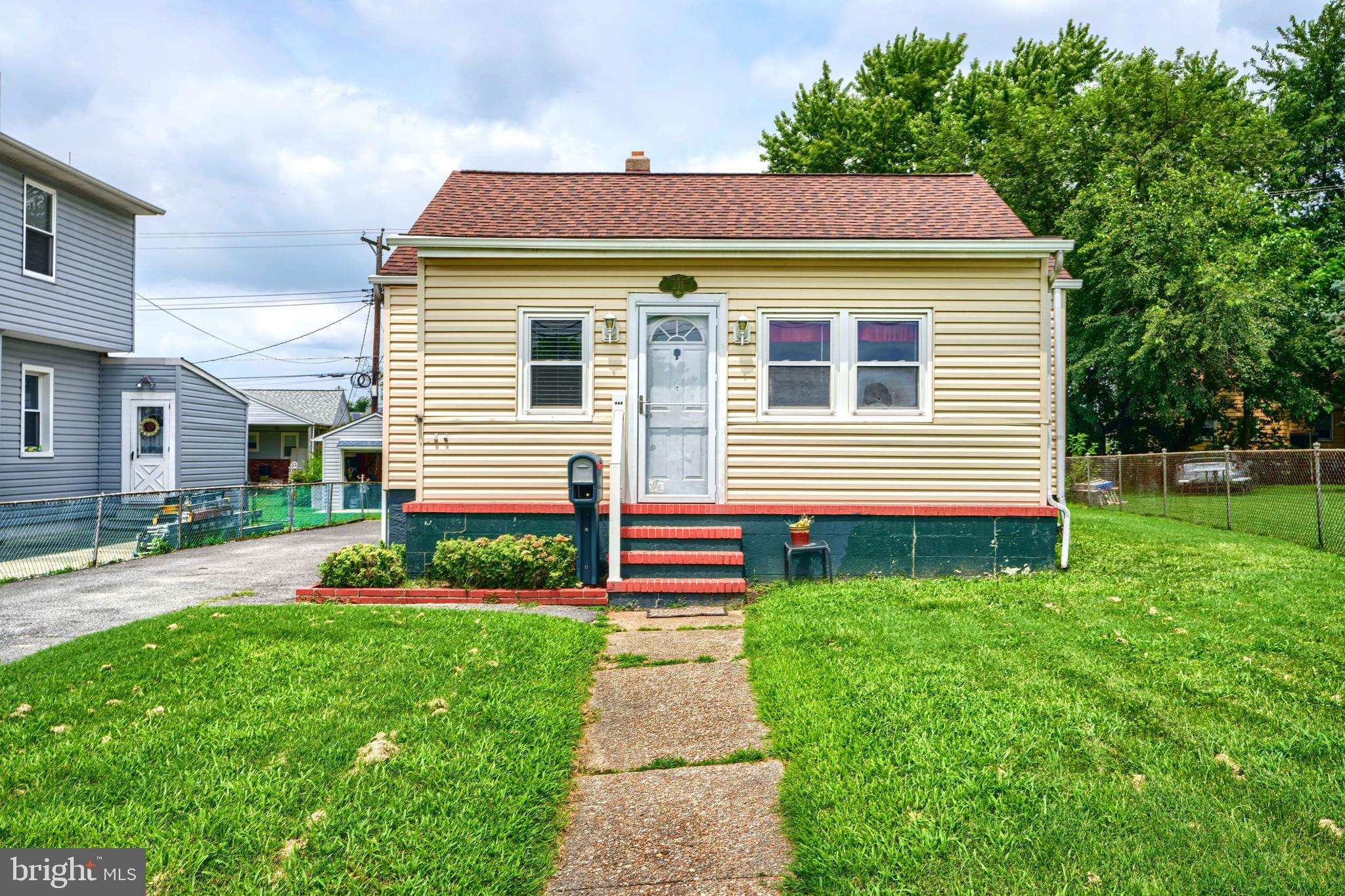 235 Trappe Road Baltimore, MD 21222 - Photo 2 of 37 a front view of a house with a yard