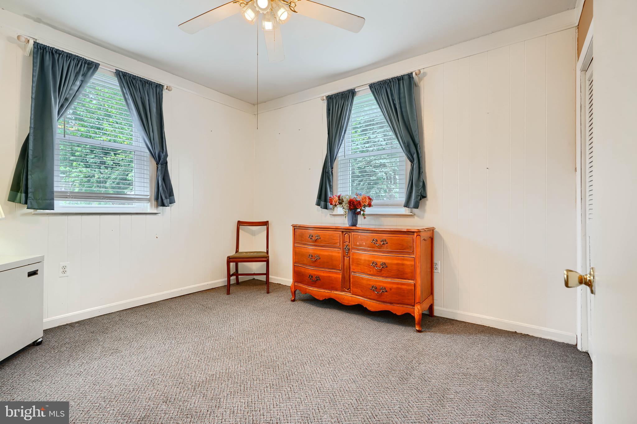 235 Trappe Road Baltimore, MD 21222 - Photo 23 of 37 an empty room with a window and ceiling fan